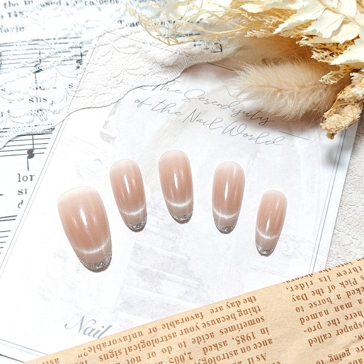 Artificial nails in elegant French manicure design Bowlift