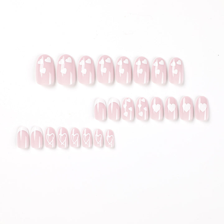 Elegant artificial nails with hearts and glitter Bowlift