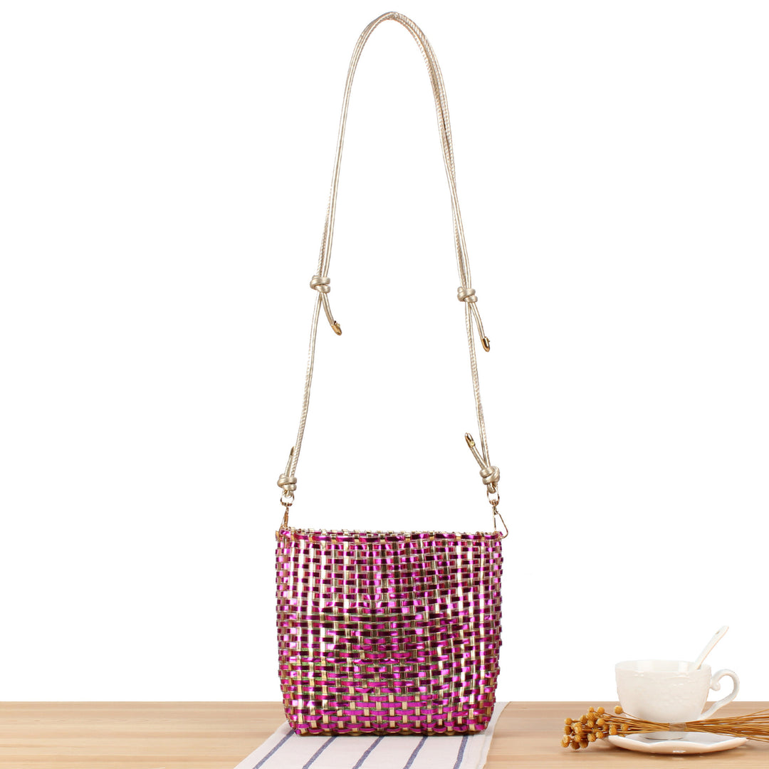 Shoulder bag made of handwoven synthetic material with fashionable sliding mechanism Bowlift