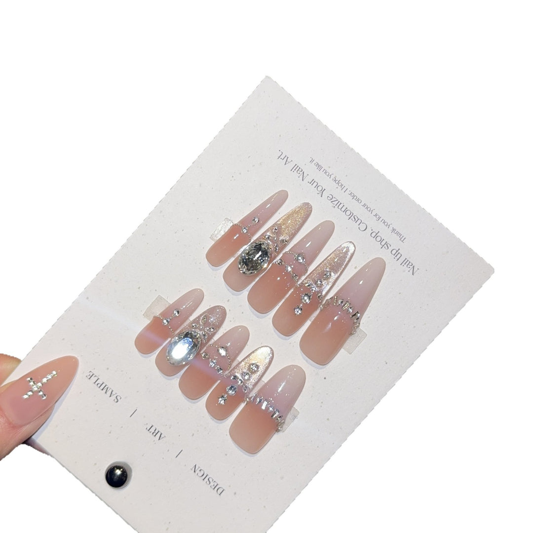 Artificial nails with elegant crystal decorations Bowlift