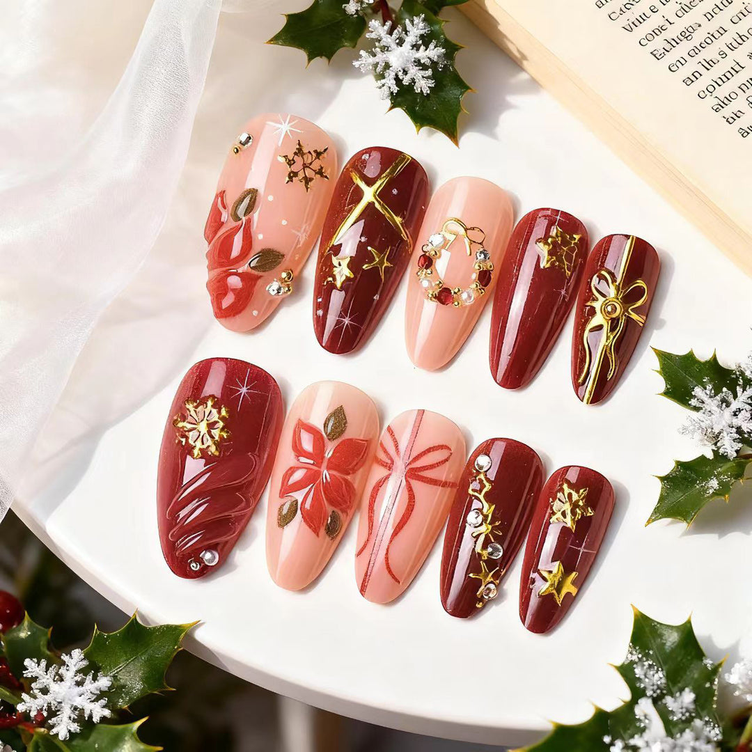 Artificial nail set in festive winter design with glamorous accents Bowlift