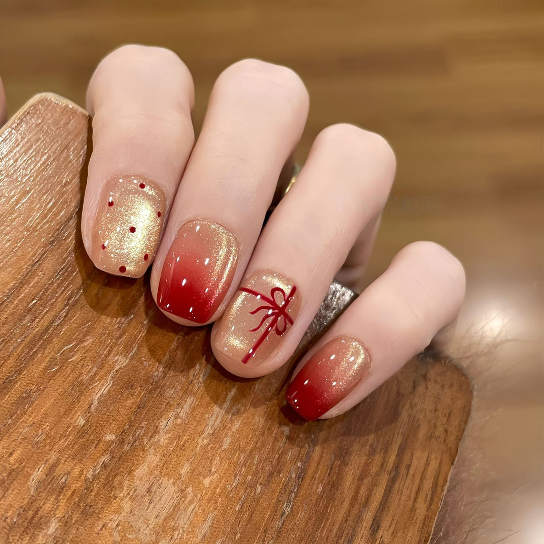 Artificial nails with festive gradient color and elegant decorations Bowlift