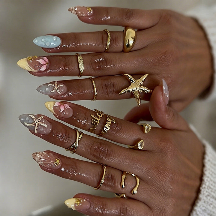 Artificial nails with floral motifs and glitter details Bowlift
