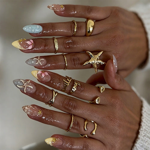 Artificial nails with floral motifs and glitter details Bowlift
