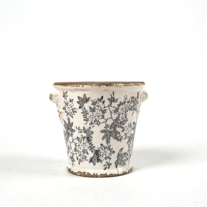 Decorative flower pot with floral embellishments Bowlift