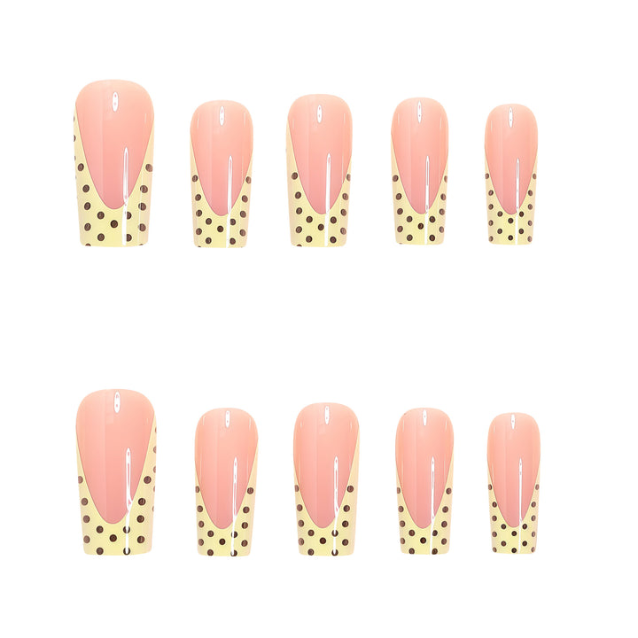Artistic Long Nail Extensions with Polka Dot Design Bowlift