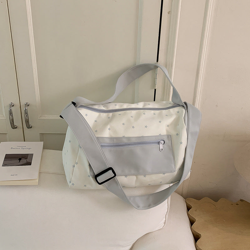 Sporty shoulder bag with practical slip pockets Bowlift