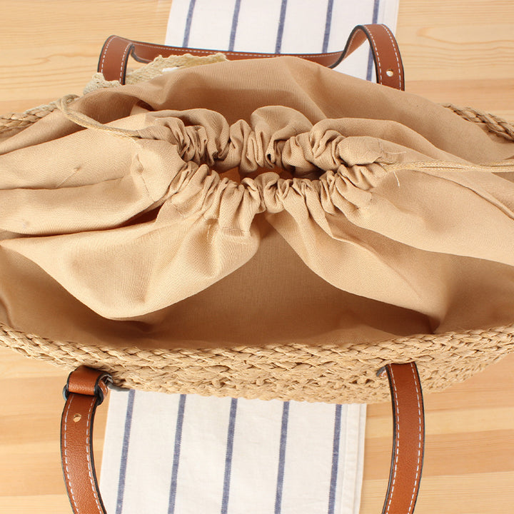 Elegant Braided Raffia Bag with Leather Accent Bowlift