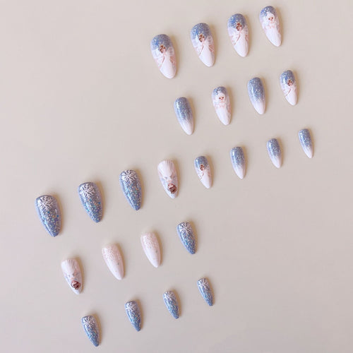 Nail art set with enchanting fairy motifs and glitter accents Bowlift