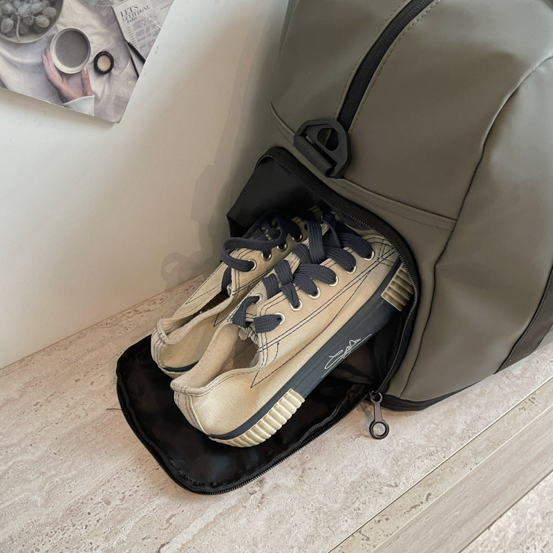 Travel and Sports Bag with Water-Repellent Material and Many Compartments Bowlift