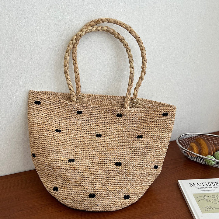 Handcrafted straw bag with geometric pattern Bowlift