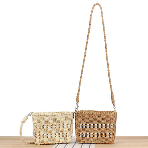 Handbag made of hand-woven natural material with pearl decoration Bowlift