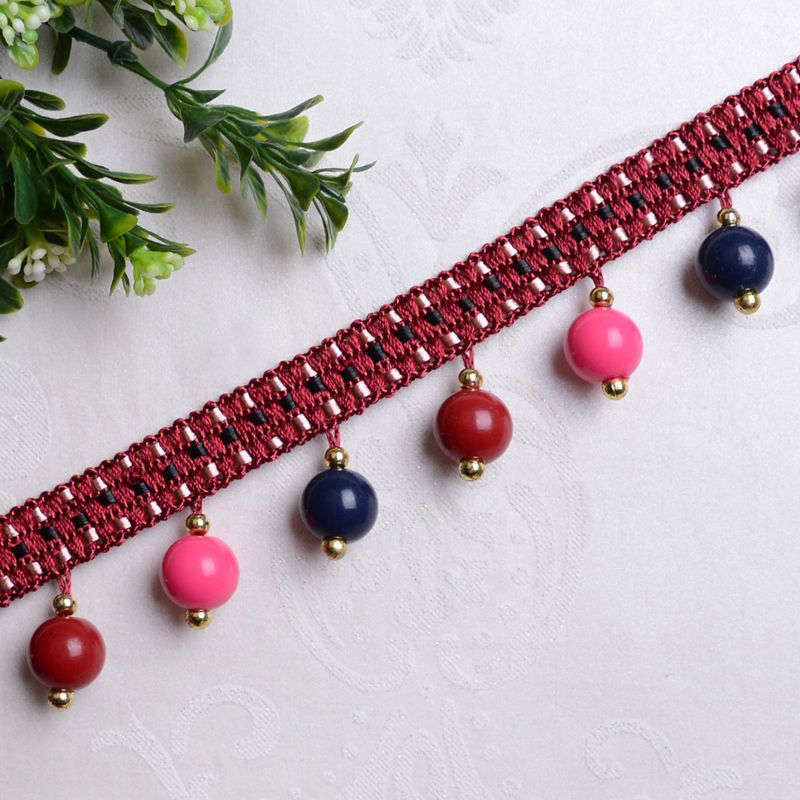 Decorative lace trim with colorful pendants Bowlift