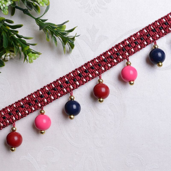 Decorative lace trim with colorful pendants Bowlift