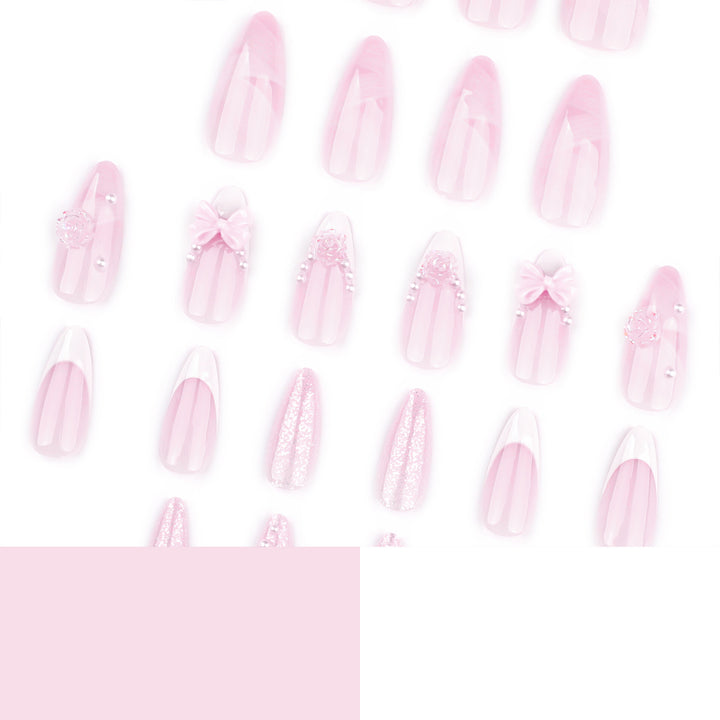 Artistic nail extensions with floral decorations and glitter accents Bowlift
