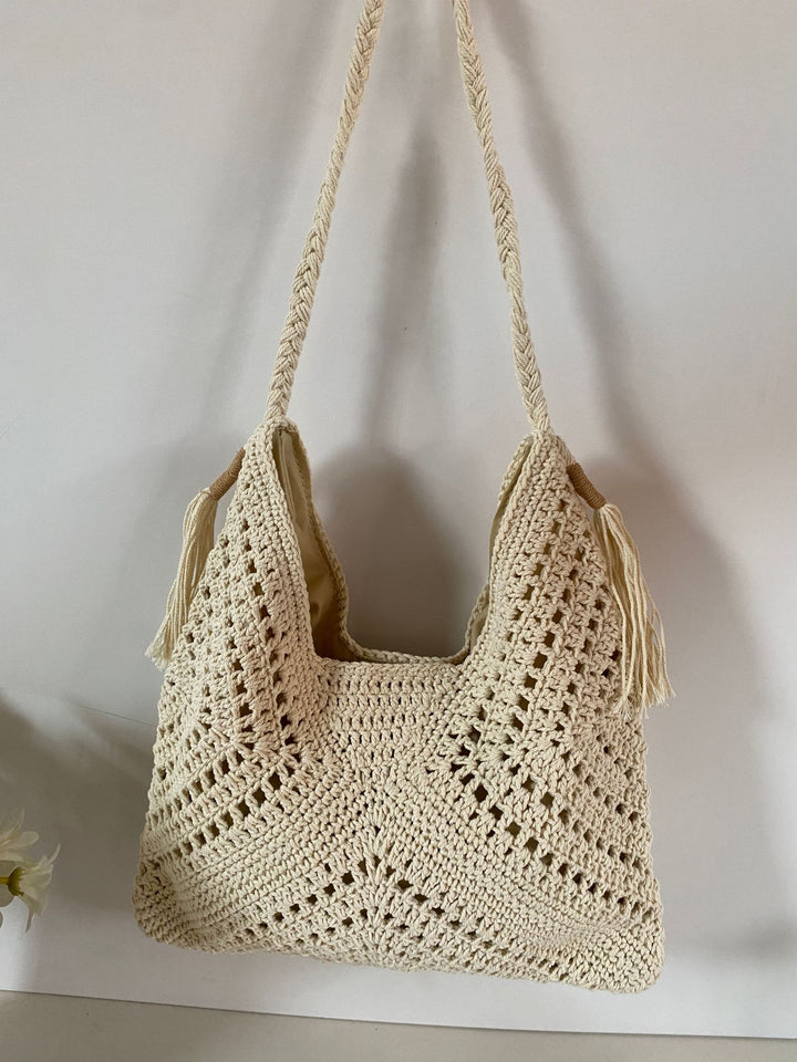 Hand-knotted shoulder bag with tassels and spacious interior Bowlift