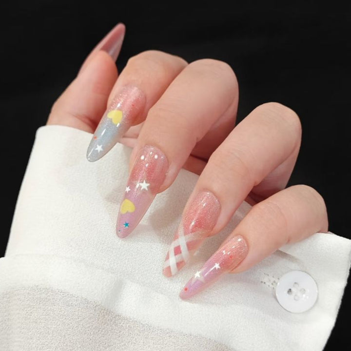 Playful artificial nails with glitter and colorful patterns Bowlift