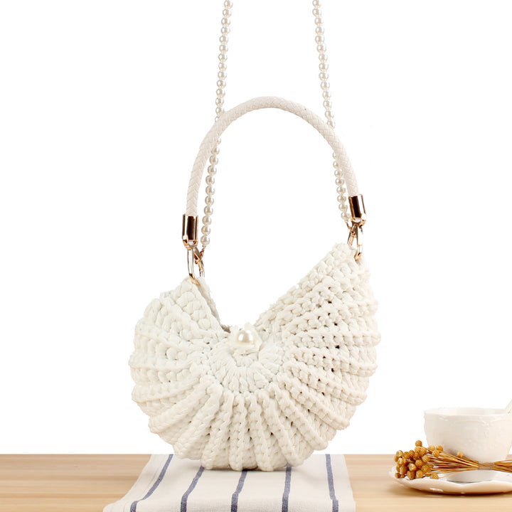 Evening bag with pearl decorated handle Bowlift