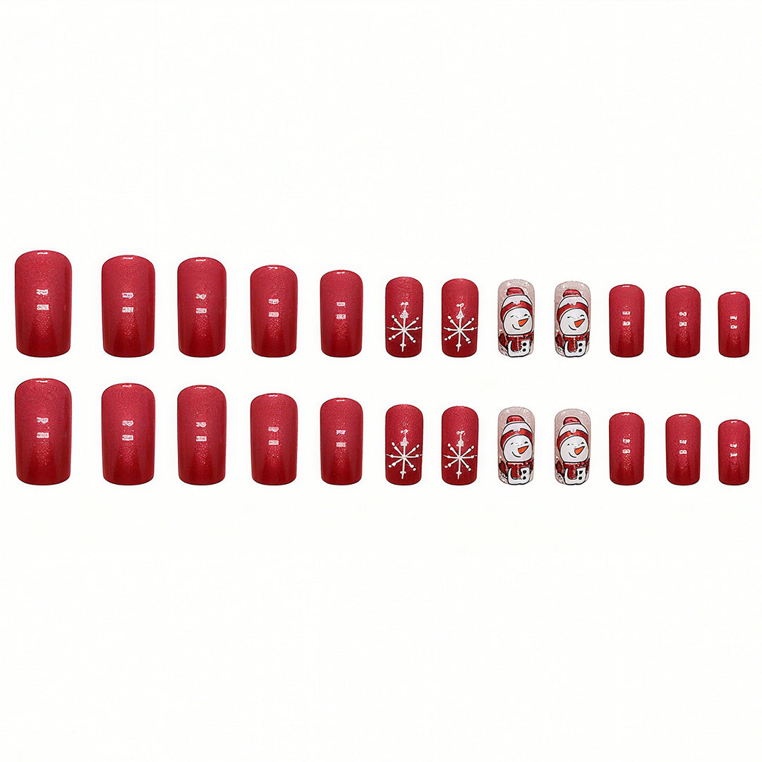 Artificial nail set with festive snowman design and glitter accents Bowlift