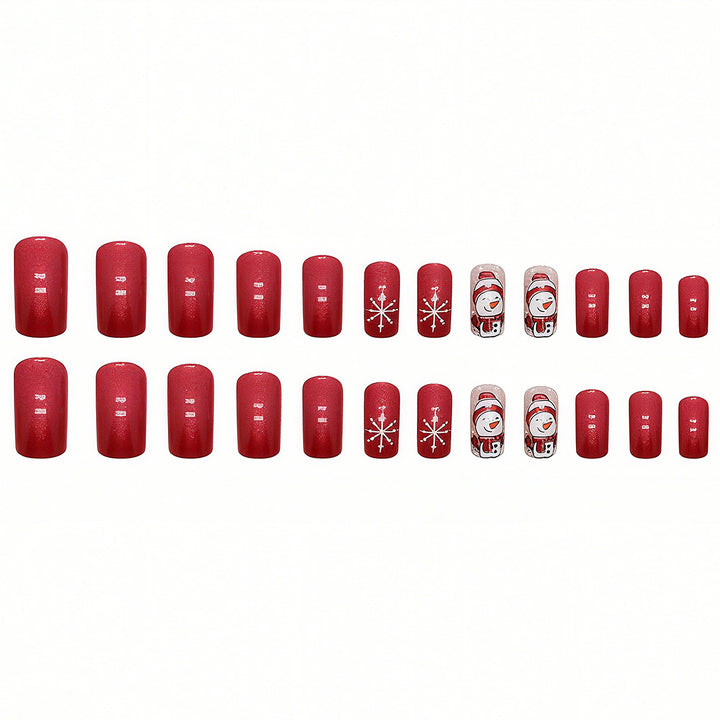 Artificial nail set with festive snowman design and glitter accents Bowlift