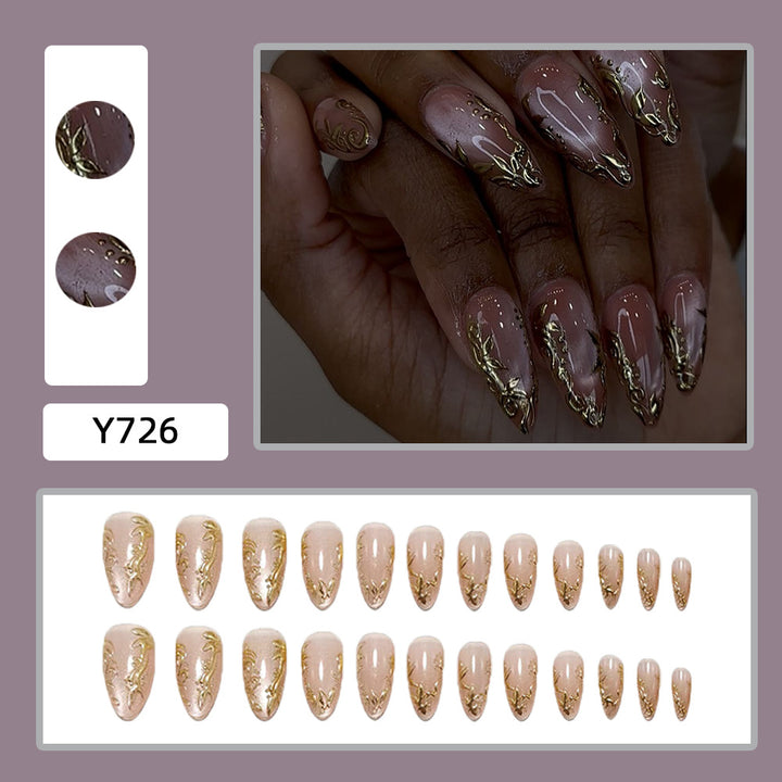 Exquisite artificial nails with golden decorations Bowlift