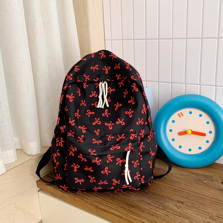 Backpack with Creative Bow Motif and Thoughtful Storage Spaces Bowlift