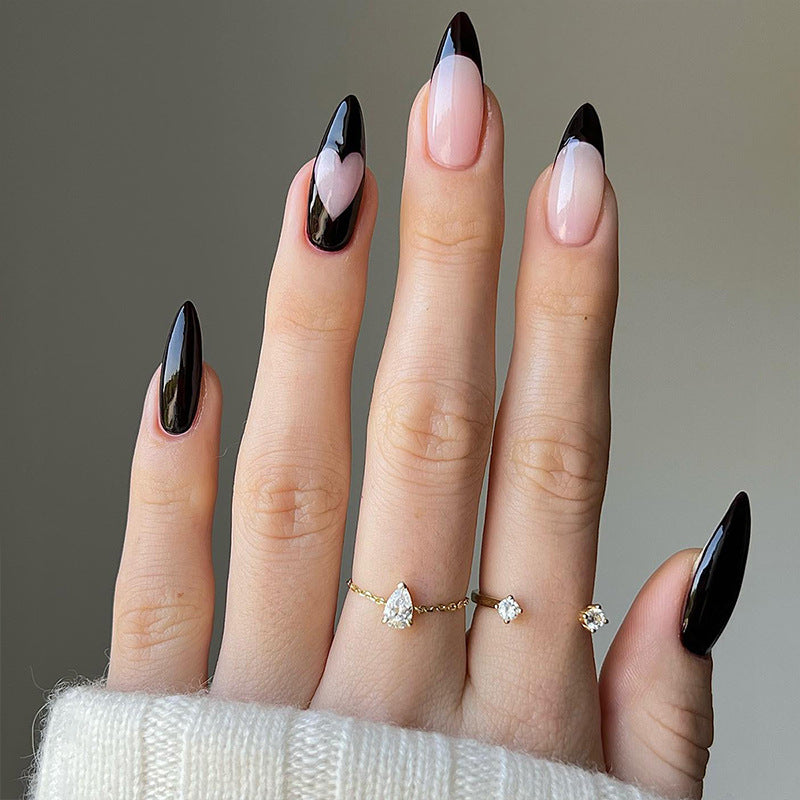 Artful stiletto nails with heart-shaped accents Bowlift