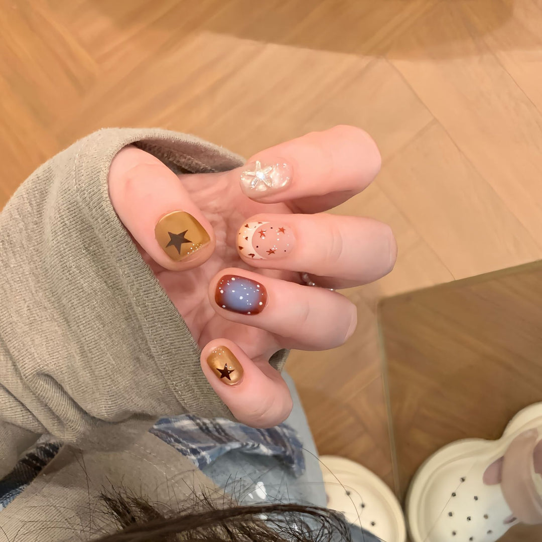 Artificial nails in modern design with star and gradient elements Bowlift