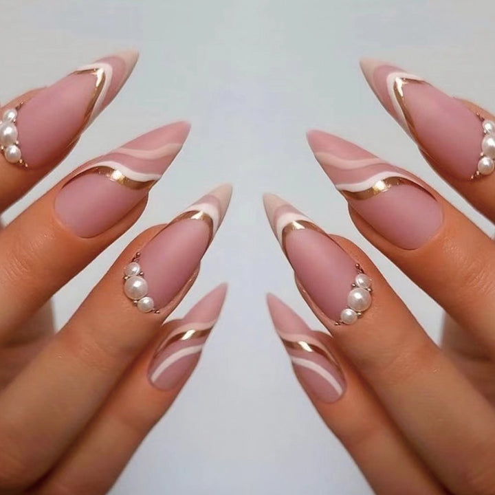 Artistic stiletto nails with elegant wave design Bowlift