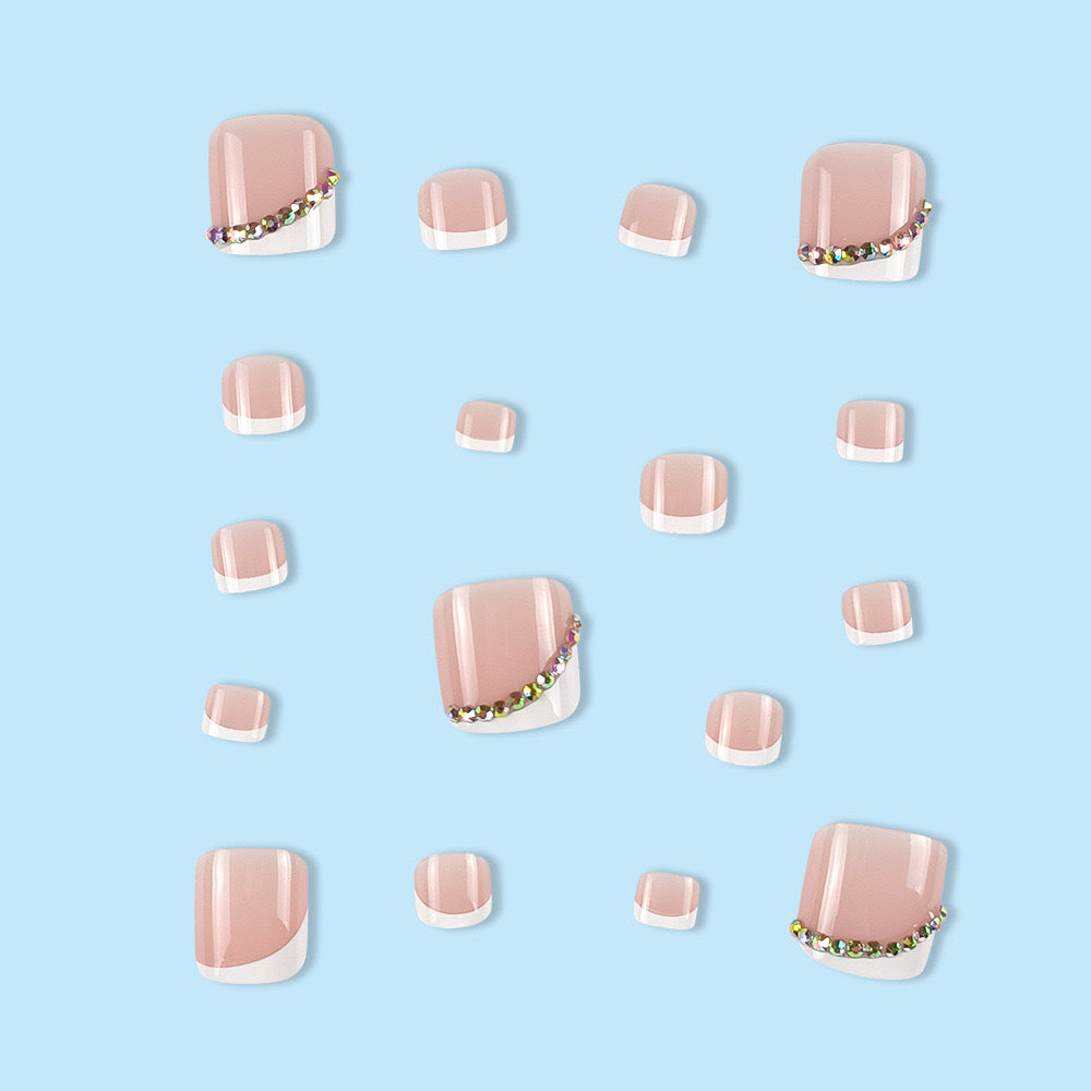 Nail art set with elegant French tips and glitter accents Bowlift