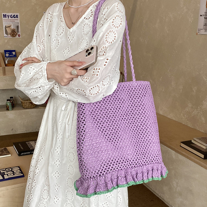 Handcrafted straw bag with fringed hem Bowlift