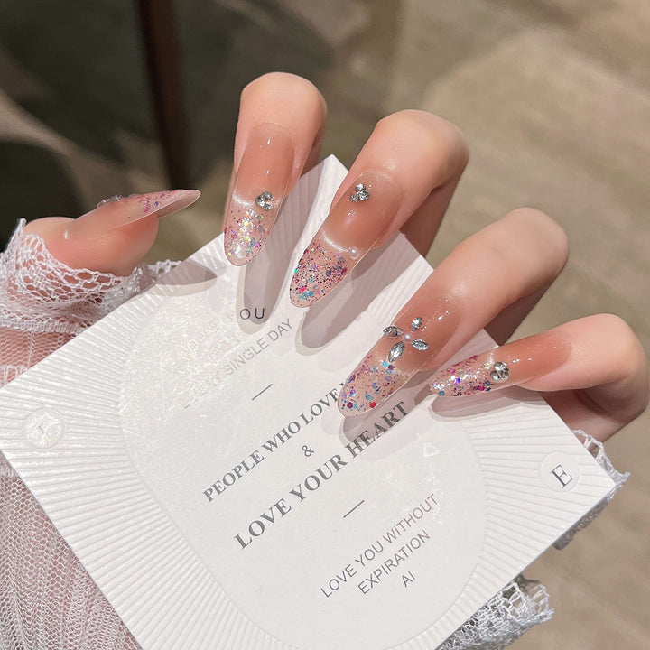 Elegant Glitter-Infused Press-On Nail Design Bowlift