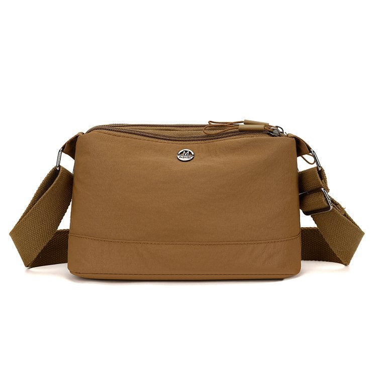 Shoulder bag with adjustable carrying strap and intelligent compartment system Bowlift