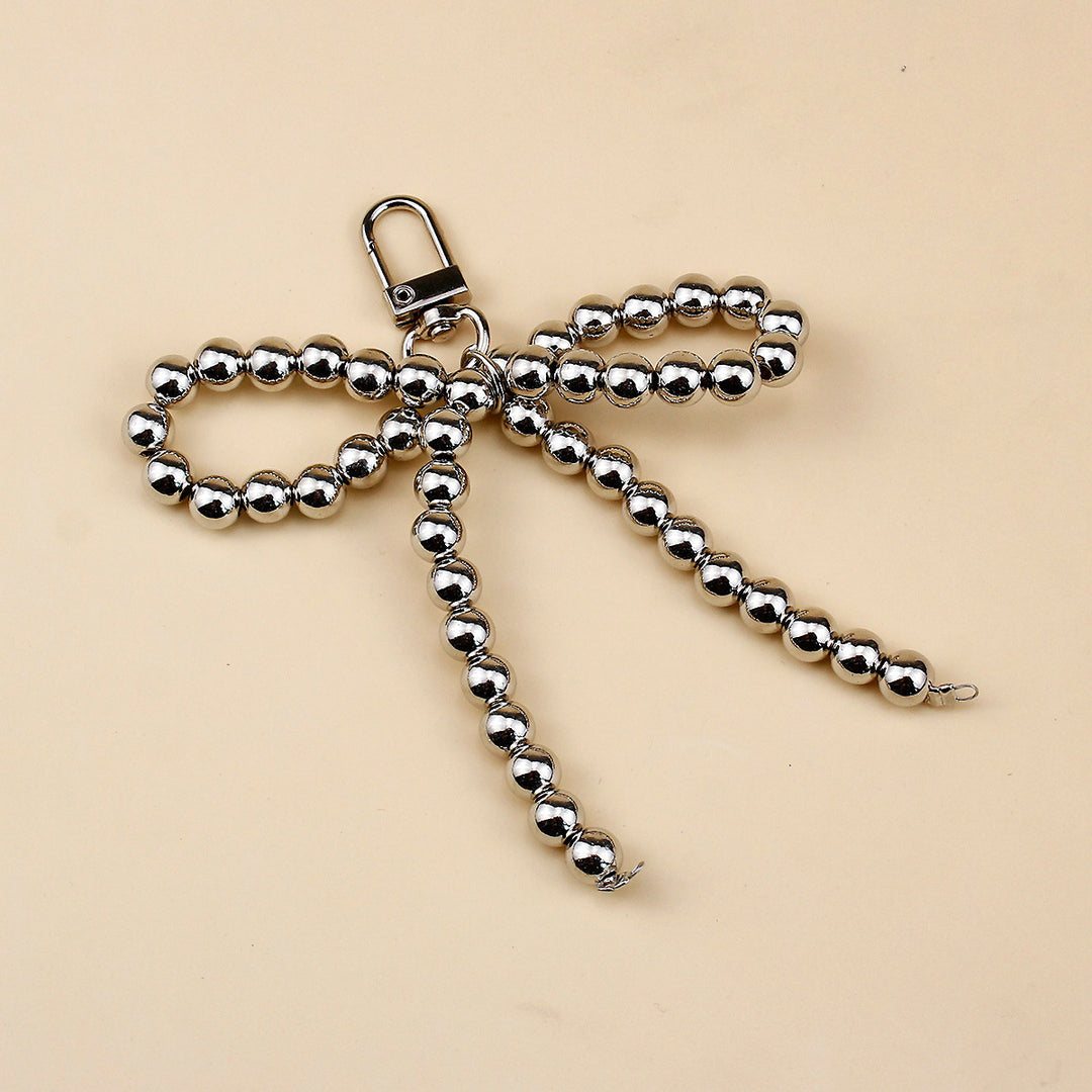 Elegant Pearl Bow Brooch Bowlift