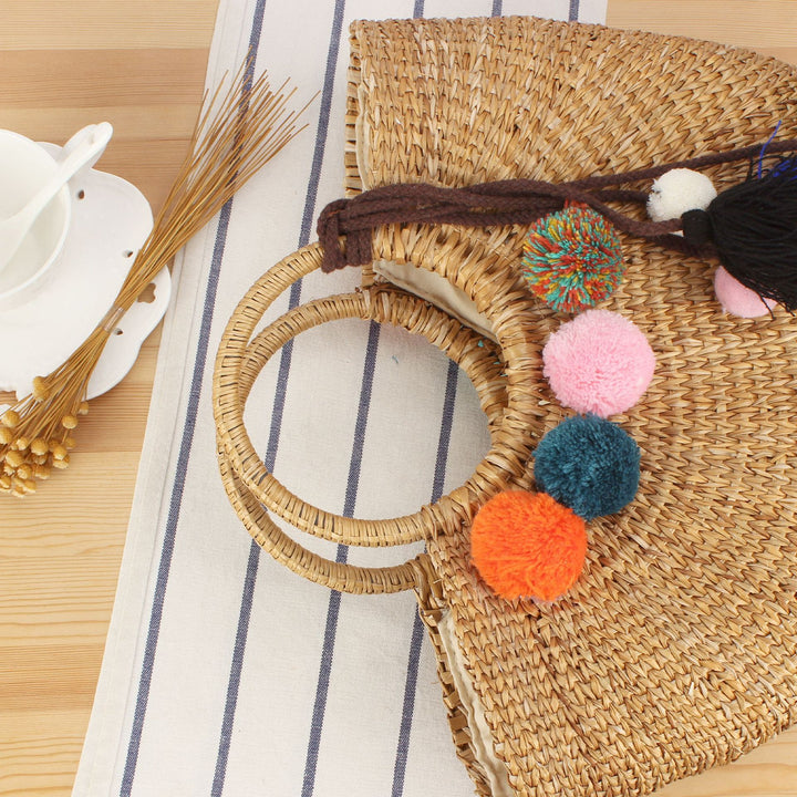 Straw handbag with colorful tassels and pom poms Bowlift