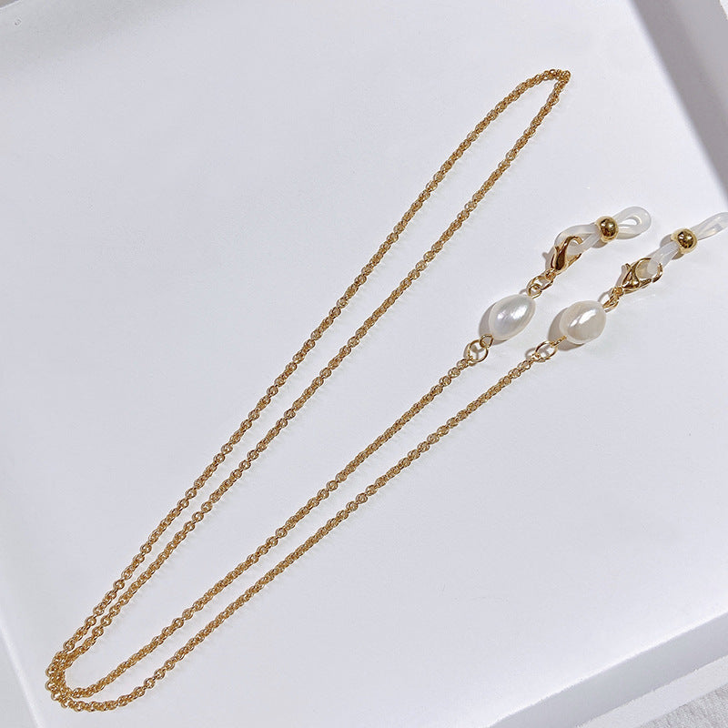 Elegant jewelry holder chain with pearl and gold accents Bowlift