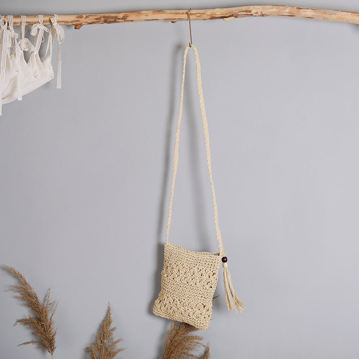 Handmade macrame shoulder bag with tassel detail Bowlift
