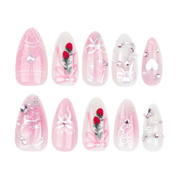 Artificial nail art with romantic design and glitter accents Bowlift