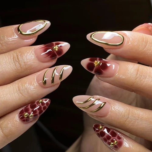 Artistic Nail Art with Elegant Embellishments Bowlift