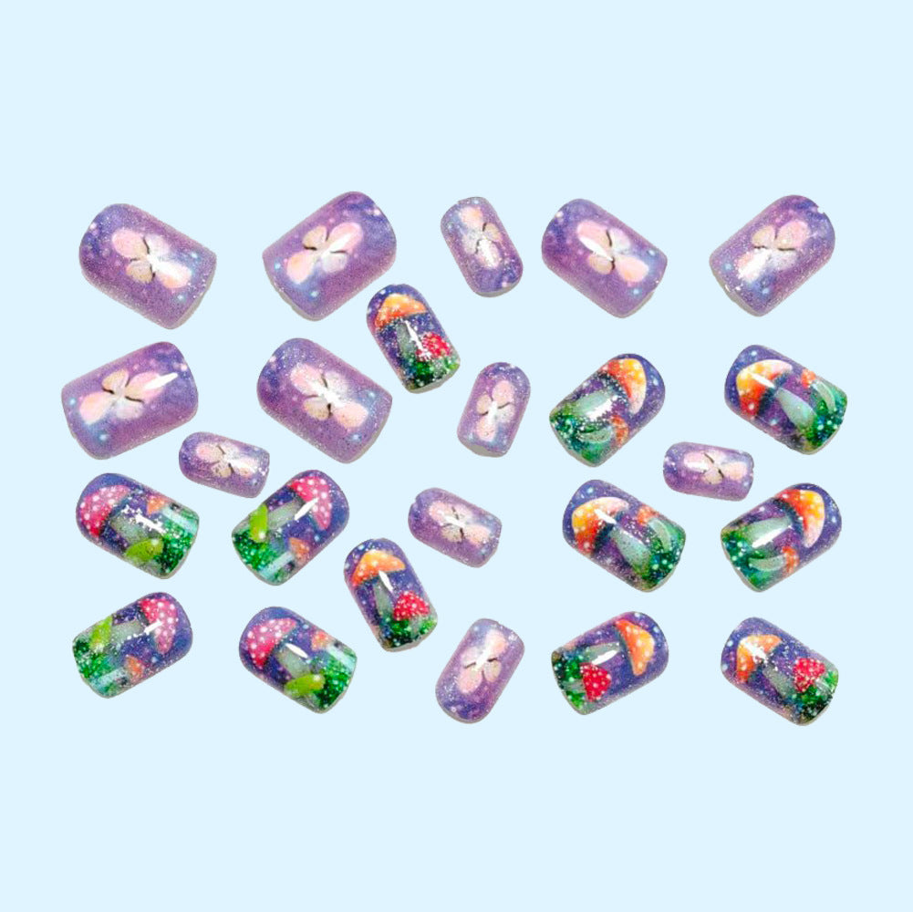 Creative nail design with mushroom and glitter accents Bowlift