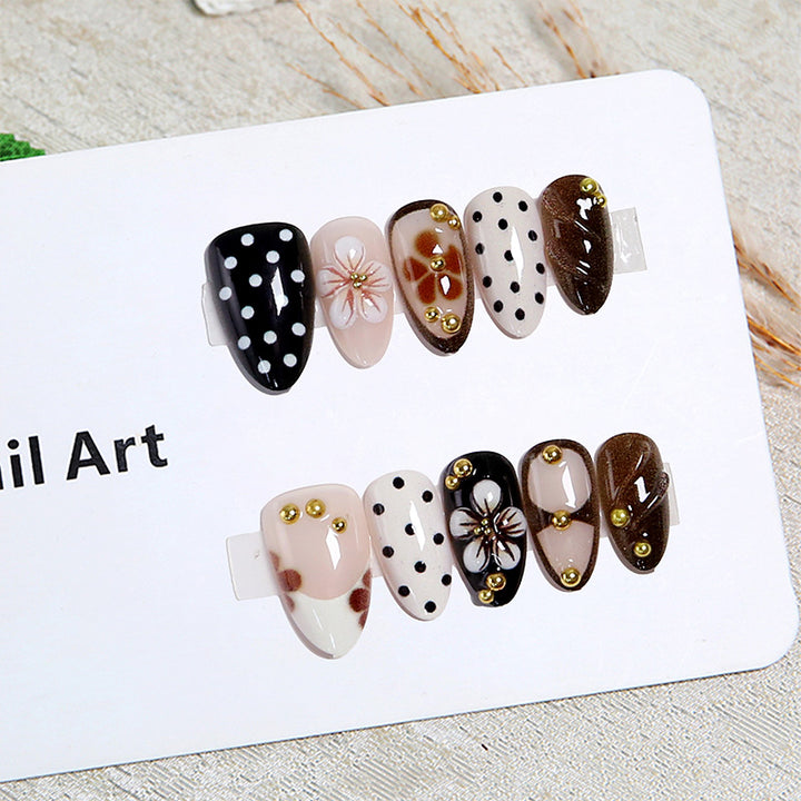 Artistic Nail Tips with Floral Designs Bowlift