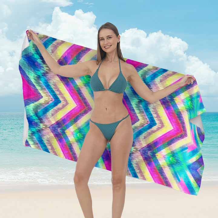 Beach towel with vibrant tropical plant motif Bowlift