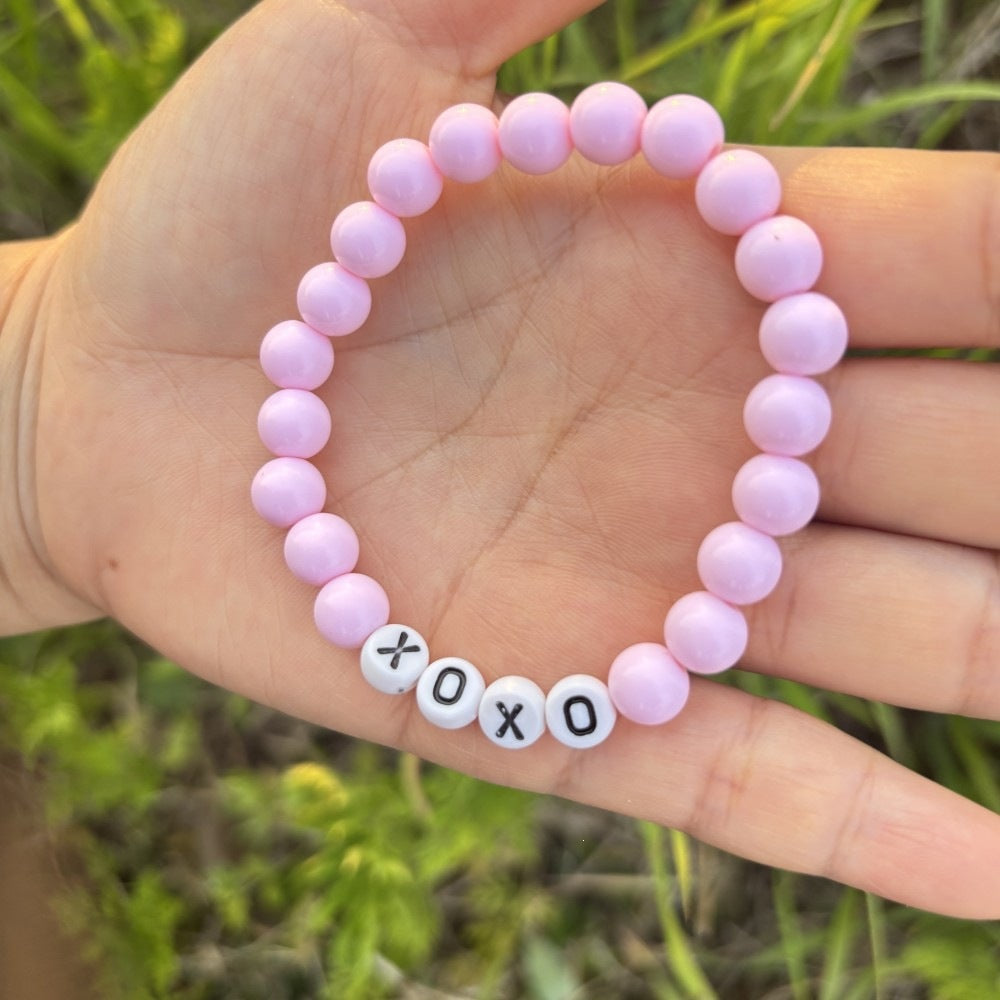 Friendship bracelet made of pastel beads Bowlift
