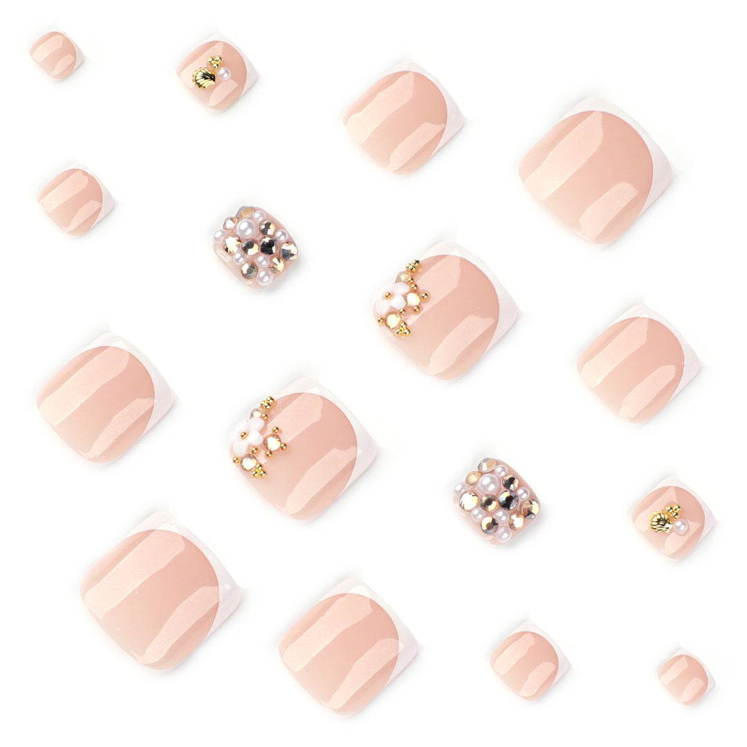 Glamorous toenail art with luxurious rhinestone and floral designs Bowlift