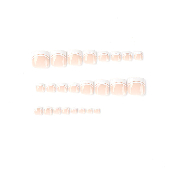 Artful toenail art with elegant French tip design Bowlift