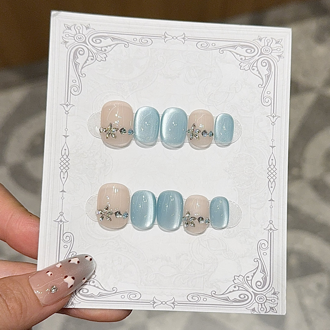 Elegant Artificial Nails with Radiant Accents Bowlift