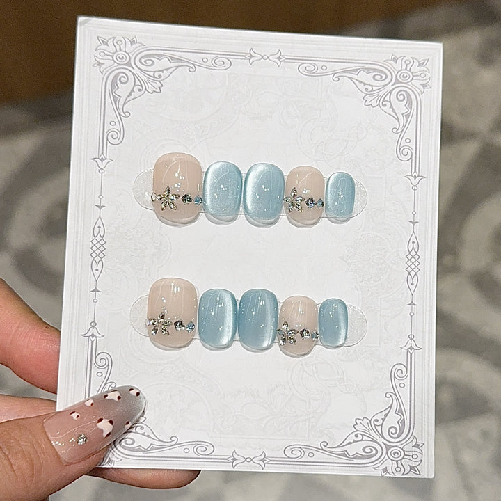 Elegant Artificial Nails with Radiant Accents Bowlift