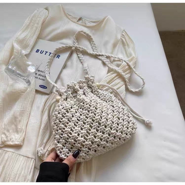 Hand-knotted shoulder bag with floral details Bowlift