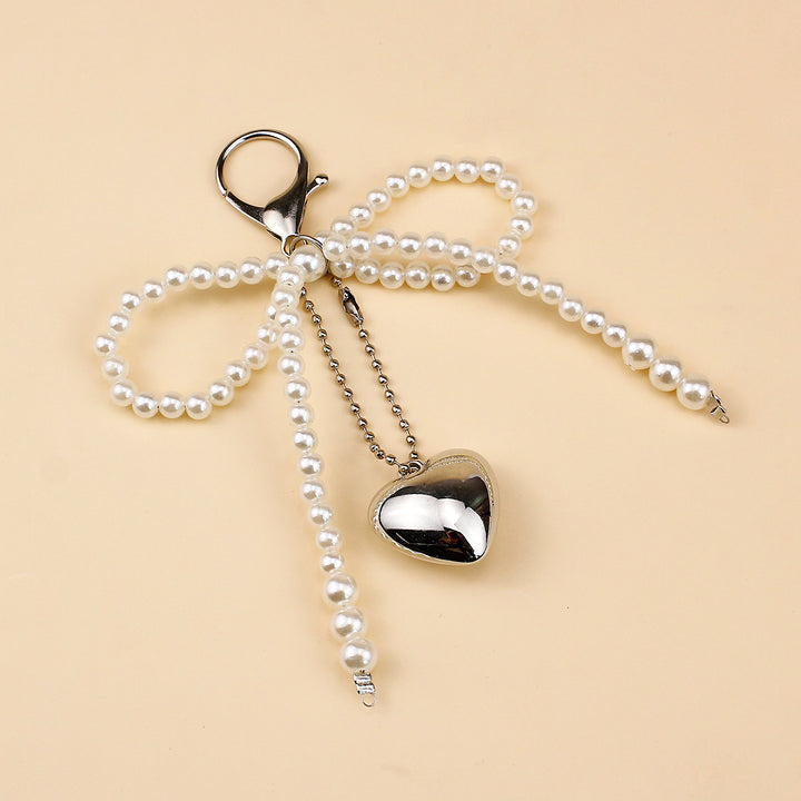 Elegant Pearl Bow Brooch Bowlift