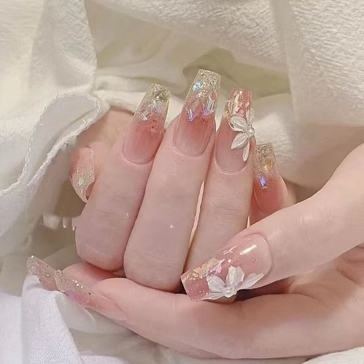 Artificial nails with playful animal motif and elegant French tip design Bowlift